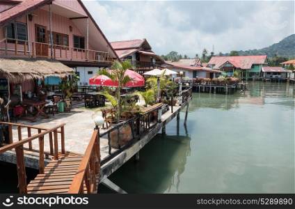 Cafe on the veranda in the fishing village of Bang Bao tropical island of Koh Chang