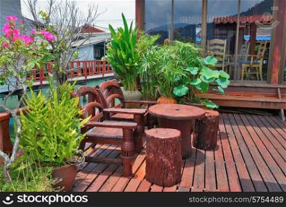 Cafe on the veranda in the fishing village of Bang Bao tropical island of Koh Chang