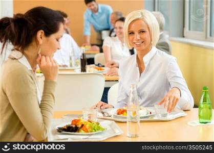 Cafeteria lunch young business woman eat salad at office canteen