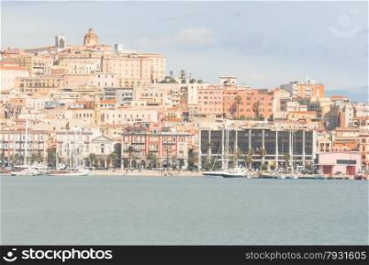 Cagliari , Seafront and Port. Roma Street and Palace of the Regional Council of Sardinia.