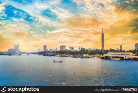 Cairo downtown with modern buildings on river Nile at sunset. Cairo downtown at sunset