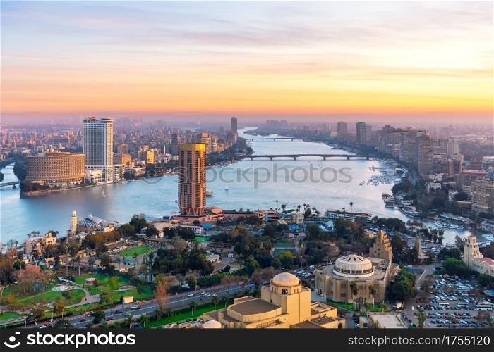 Cairo downtown with Skyscrappers on the Nile at sunset, Egypt .