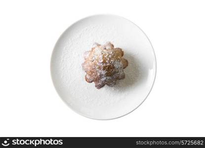Cake at plate on white background. Top view.
