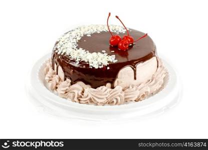 cake closeup with cherry isolated on a white
