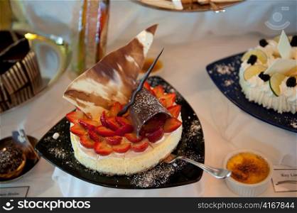 Cake garnish with strawberry in cruise ship Silver Shadow, East China Sea