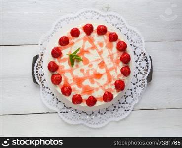 Cake Strawberry cream cheese on white wood.. Cake Strawberry cream cheese on white wood