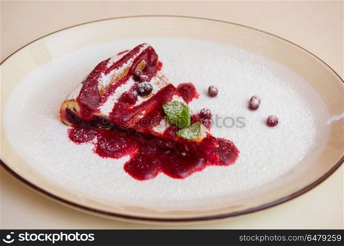 cake with cowberry. tasty cake with cowberry and fresh mint
