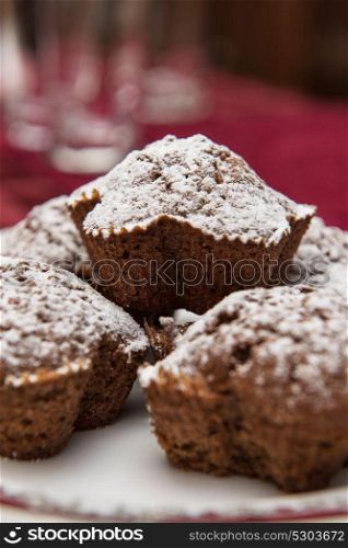 cake with raisins. cake with raisins at the plate, sprinkled with powdered sugar