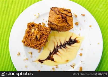 Cake with sweet sauce in plate