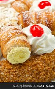 cake with whipped cream and cream puffs