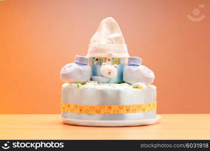 Cakes made of diapers on white