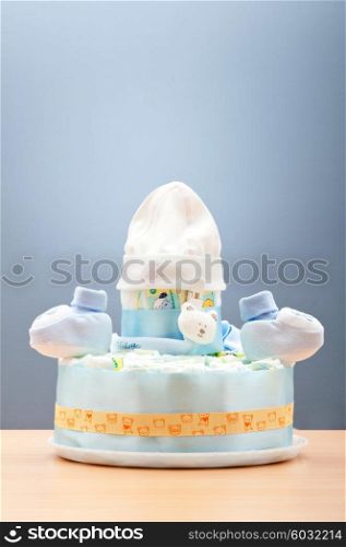 Cakes made of diapers on white