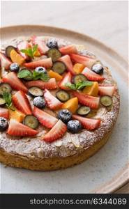 cakes with fruit and berries. Sweet bright cakes with fruit and berries