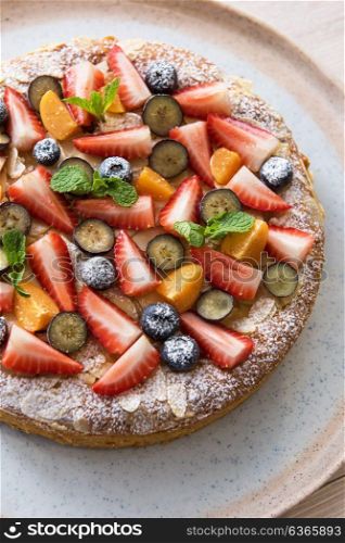 cakes with fruit and berries. Sweet summer bright cakes with fruit and berries