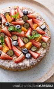 cakes with fruit and berries. Sweet summer bright cakes with fruit and berries