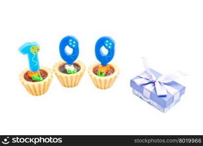 cakes with one hundred years birthday candles and gift on white background