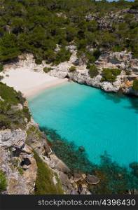 Cala Macarelleta in Ciutadella Menorca at turquoise Balearic Islands Mediterranean sea