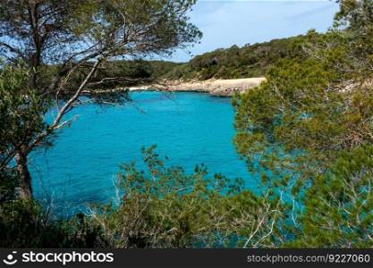Cala Mondrago is a secluded resort beach in Mallorca with calm waters sheltered by surrounding headlands