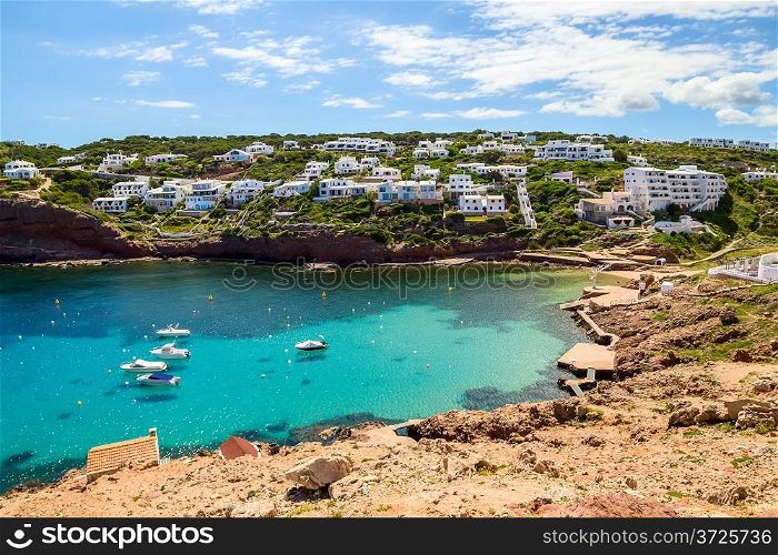 Cala Morell cove scenery in sunny day at Menorca, Spain.