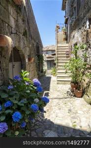 Calcata, Rome, Lazio, Italy: typical alley of the medieval village