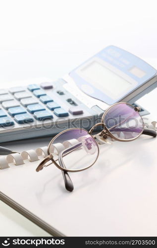 Calculator and glasses