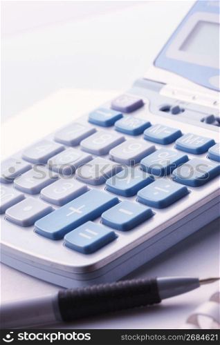 Calculator and pen