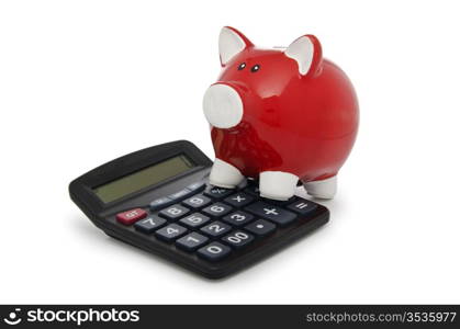 Calculator and piggy bank on white