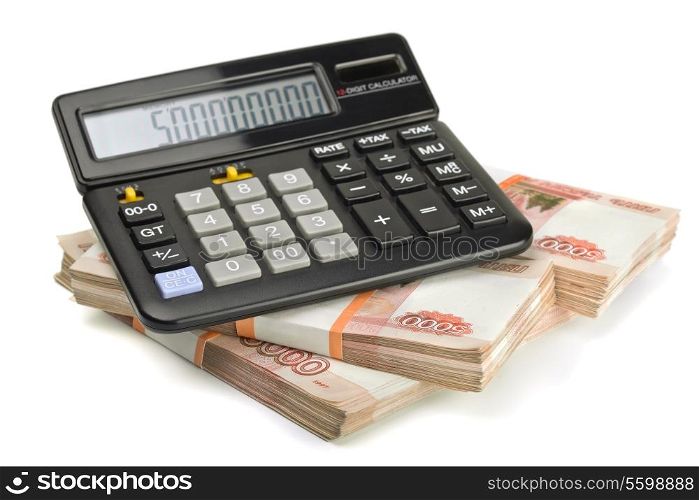Calculator and stack of money isolated on white