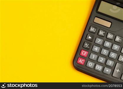 calculator for accountant on yellow background