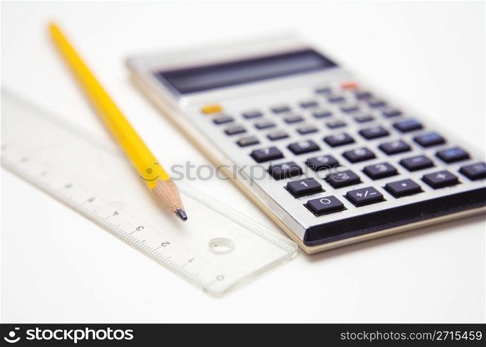 Calculator, pencil and ruler.