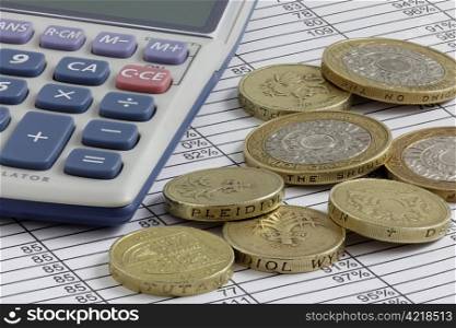 Calculator & Pound Coins on a Spreadsheet with extended depth of field