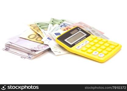 Calculator with euro bank notes isolated