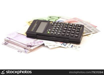 Calculator with euro bank notes isolated on white