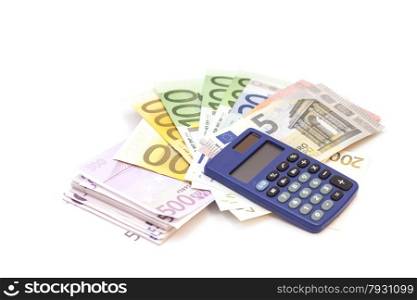 Calculator with euro bank notes isolated on white