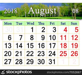 calendar for August 2018 with landscape with storm clouds. calendar for August 2018 with landscape with storm clouds under the forest