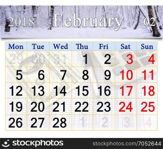 calendar for February of 2018 with winter landscape. beautiful calendar for February 2018 with snowy birch grove