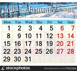 calendar for January of 2018 with winter landscape. calendar for January of 2018 with image of snow-covered fence in the village