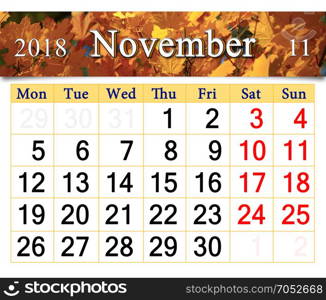 calendar for November 2018 with yellow leaves. calendar for November 2018 with the ribbon of fallen yellow leaves