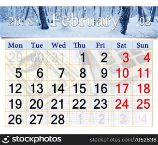 calendar for the February of 2018 with winter landscape. calendar for the February of 2018 on the background of snow-covered forest