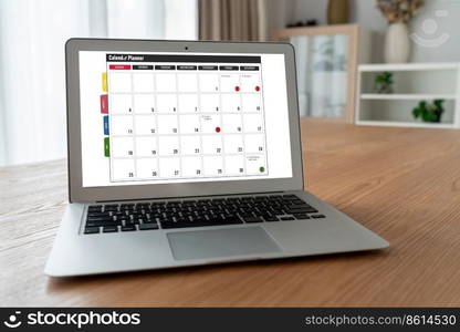 Calendar on computer software application for modish schedule planning for personal organizer and online business. Calendar on computer software application for modish schedule planning