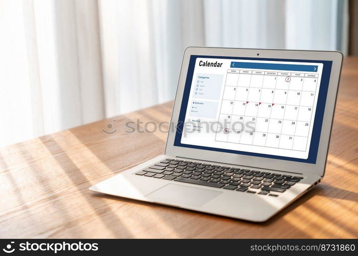 Calendar on computer software application for modish schedule planning for personal organizer and online business. Calendar on computer software application for modish schedule planning