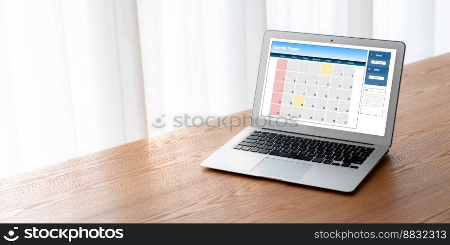 Calendar on computer software application for modish schedule planning for personal organizer and online business. Calendar on computer software application for modish schedule planning