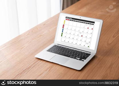 Calendar on computer software application for modish schedule planning for personal organizer and online business. Calendar on computer software application for modish schedule planning