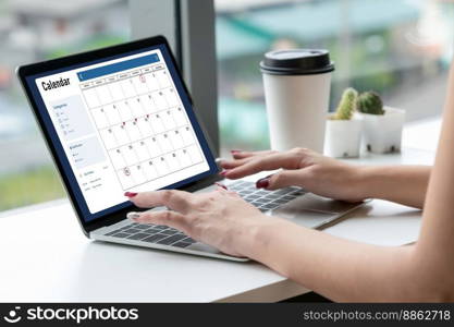 Calendar on computer software application for modish schedule planning for personal organizer and online business. Calendar on computer software application for modish schedule planning