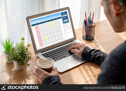 Calendar on computer software application for modish schedule planning for personal organizer and online business. Calendar on computer software application for modish schedule planning