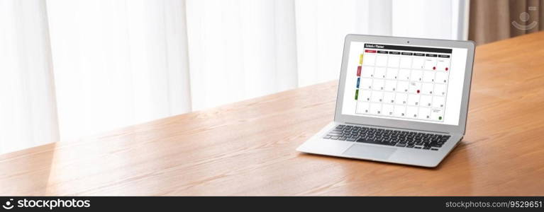 Calendar on computer software application for modish schedule planning for personal organizer and online business. Calendar on computer software application for modish schedule planning
