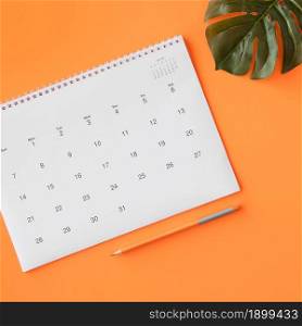 calendar with pencil monstera leaf. Resolution and high quality beautiful photo. calendar with pencil monstera leaf. High quality beautiful photo concept
