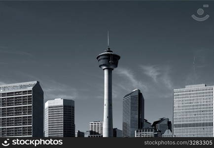 Calgary Tower surrounded by buildings.