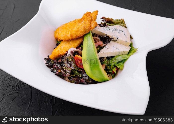 California chicken nuggets cobb salad on plate