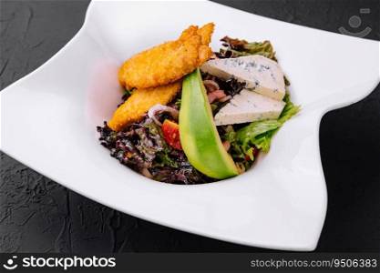 California chicken nuggets cobb salad on plate